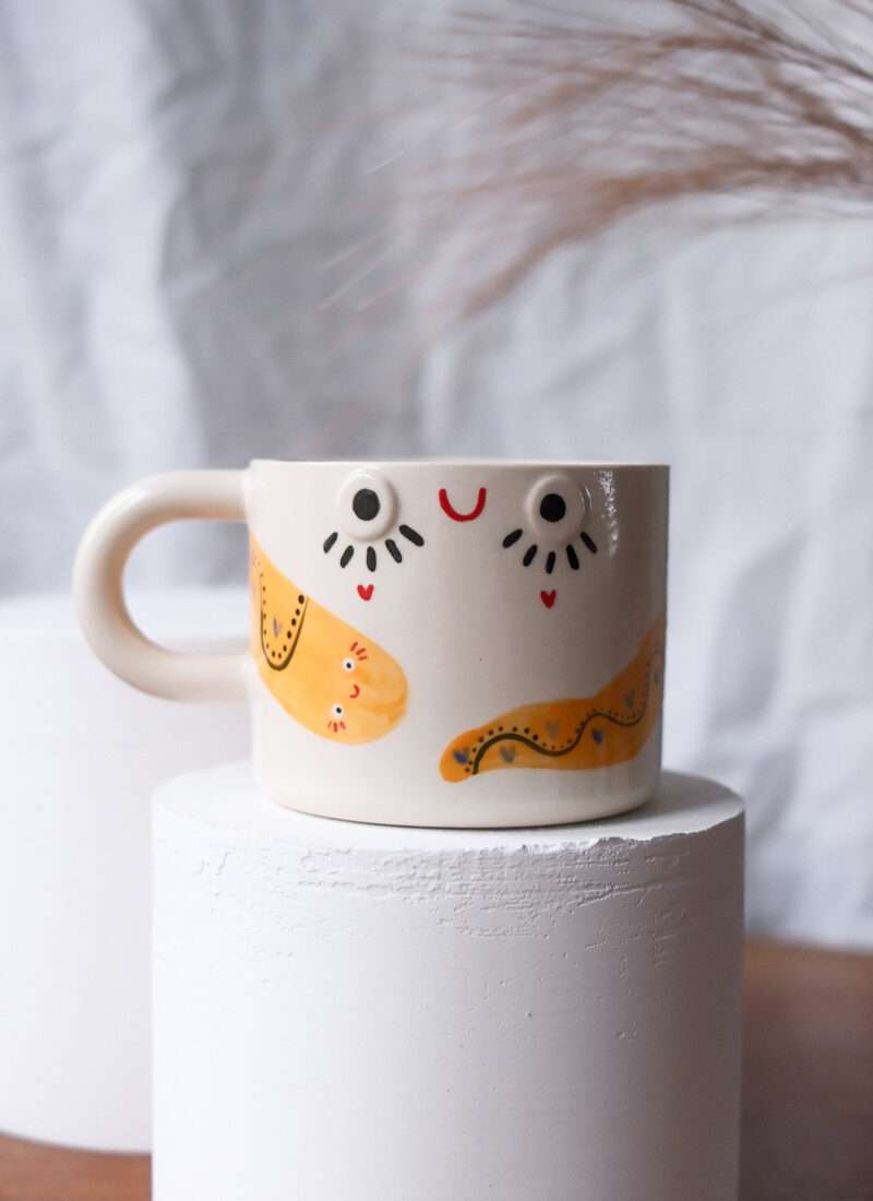 duży kubek z wężem we wzorki